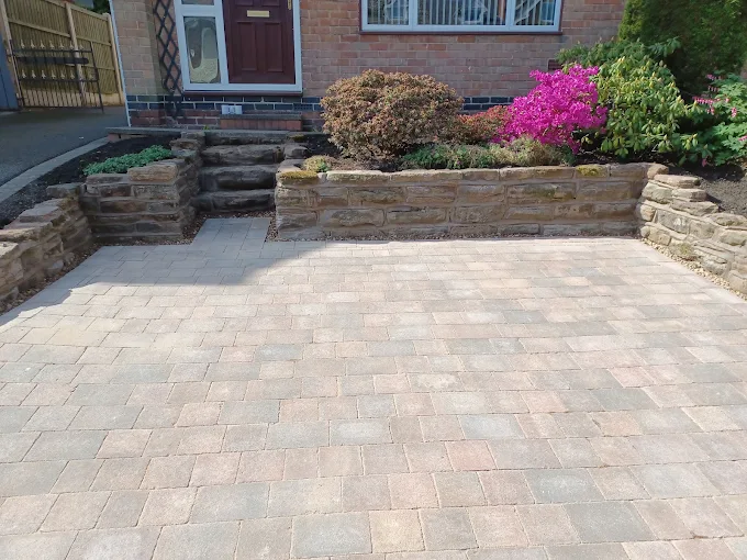 Block-paved driveway and raised beds completed by RMS Building and Landscaping