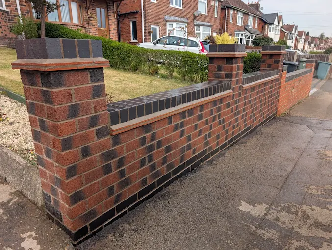New brick boundary wall built by RMS Building and Landscaping