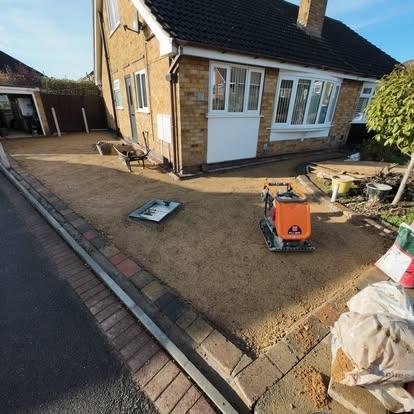 Driveway ground preparation by RMS Building and Landscaping