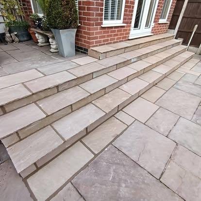Completed sandstone steps and paving by RMS Building and Landscaping