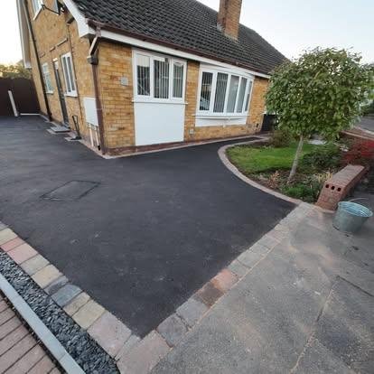Curved tarmac driveway completed by RMS Building and Landscaping
