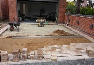 A driveway installed in front of a garage (that we also built) in Woodthorpe, Nottingham.