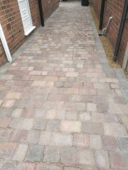 A concrete driveway uplifted, groundwork prepared then a marshalls tegula pavers, mixed harvest and traditional colours used to create this driveway in Hucknall, Nottingham.