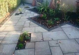 A full rear landscape project in Gedling, Nottingham, using charcoal edging sets installed with a kandla grey indian sandstone infill. Brick butresses built, coping stones on walls relayed and wall rendered. A full rear landscape project in Gedling, Nottingham, using charcoal edging sets installed with a kandla grey indian sandstone infill. Brick butresses built, coping stones on walls relayed and wall rendered.