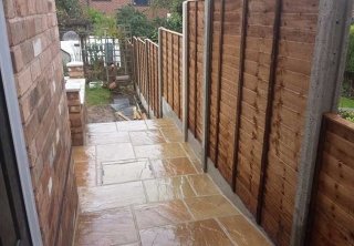 A patio we layed in Gedling, Nottingham once we had built the retaining wall, steps and installed the fence A patio we layed in Gedling, Nottingham once we had built the retaining wall, steps and installed the fence