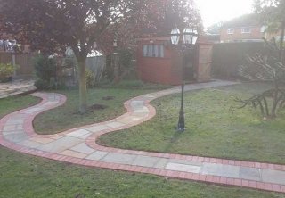 A path we created at a job in Edwalton, Nottingham using a red pavior for the edging and a multi buff indian sanstone for the infill of the path A path we created at a job in Edwalton, Nottingham using a red pavior for the edging and a multi buff indian sanstone for the infill of the path